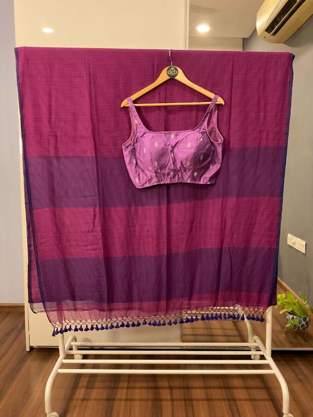 Striped saree with a lilac silk blouse with gold butas