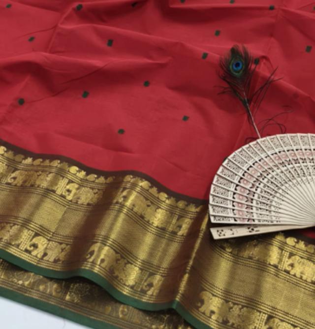 Red Kanchi cotton saree with a wide gold zari border